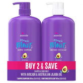 Aussie Miracle Moist shampoo bottle pour hydrates dry hair with avocado and jojoba oil.