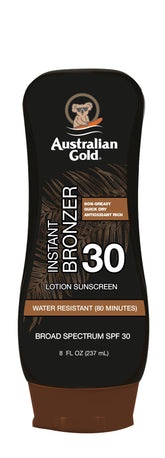 Australian Gold sunscreen instant bronzer bottle delivers a sun-kissed glow during application