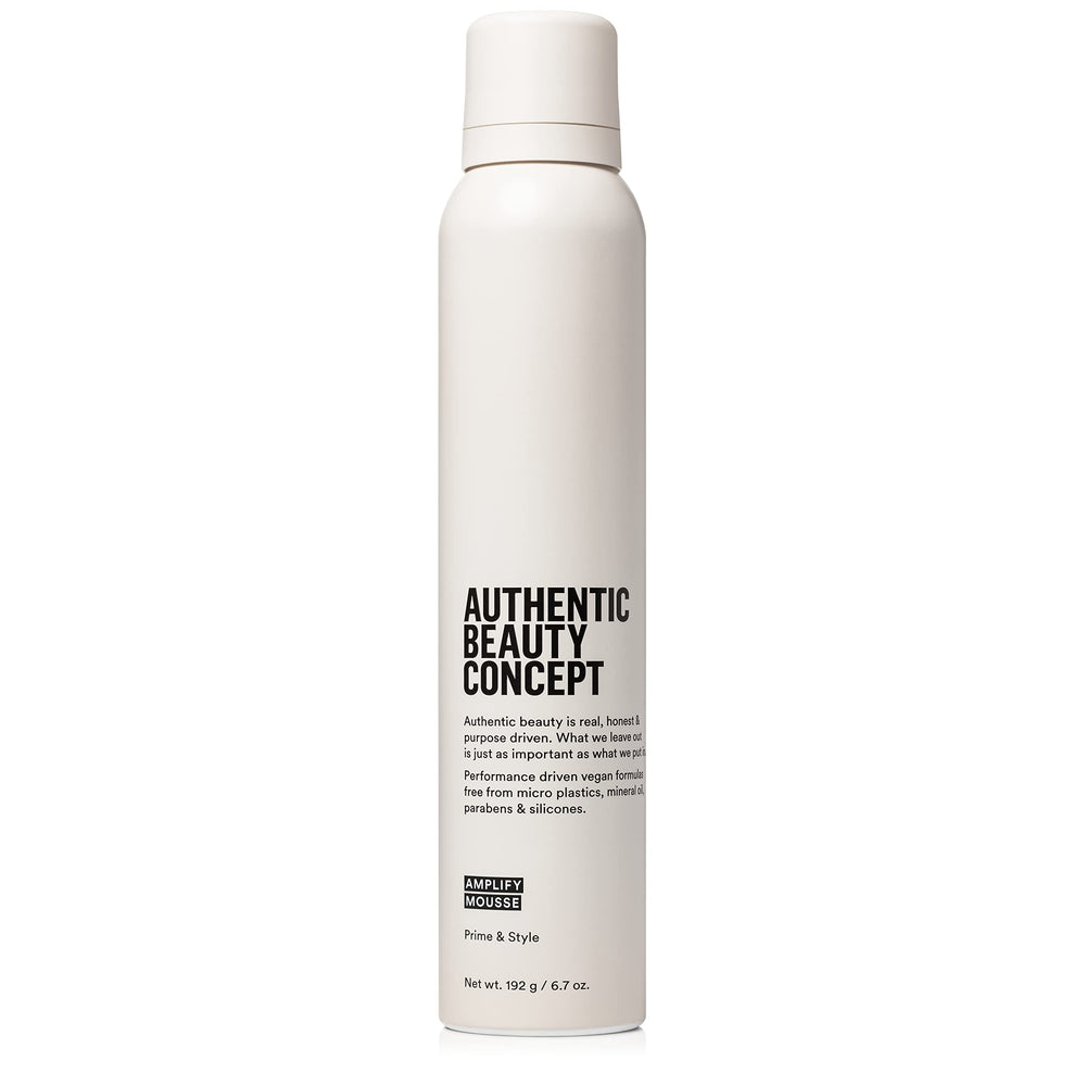 Authentic Beauty Concept Amplify Mousse bottle with pump for easy, lightweight styling.
