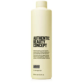 Authentic Beauty Concept Replenish Cleanser bottle closeup, providing nourishing cleansing.