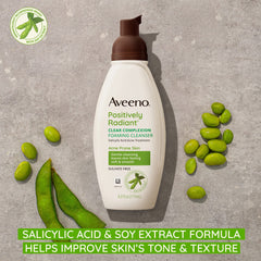 Aveeno foaming cleanser close-up showing rich lather and gentle cleansing.