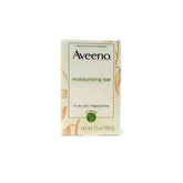 Aveeno Naturals Moisturizing Bar close-up showing oatmeal texture for dry skin care.