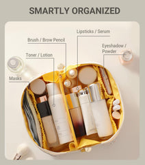 Aveniee travel makeup bag clear divider keeps cosmetics organized.