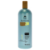 Avlon KeraCare dry scalp shampoo bottle highlights anti-dandruff and moisturizing action