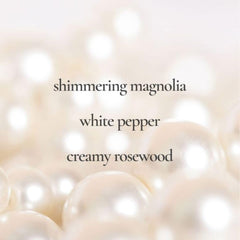 AVON Rare Pearls magnolia note closeup highlights bright floral opening.