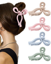 Pinza AWAYTR con lazo rosa para un look elegante y cómodo.