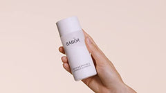 Close-up of BABOR cleanser delivering a brightening glow after use