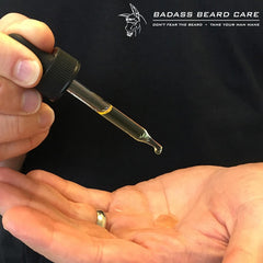 Badass Outlaw beard oil on beard for softer feel and fuller look