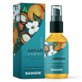Badger Argan Hair Oil bottle pump showcases easy application and travel-friendly design.