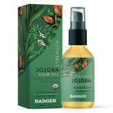 Badger Organic Jojoba Hair Oil bottle for easy scalp hydration on the go