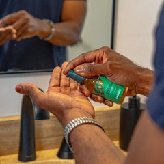 Badger Organic Jojoba Hair Oil pump top for mess-free application and quick soothing