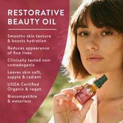 Badger Rose Face Oil beside Bulgarian rose petals for soothing glow