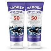 Badger sunscreen bottle demonstrates easy rub-in application for travel-friendly SPF 50 protection.