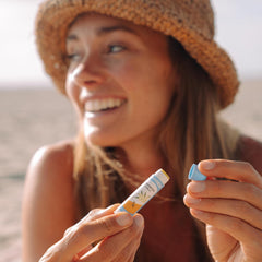 Close-up of Badger lip balm texture shows a silky finish on lips.