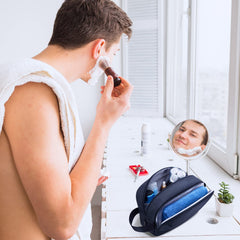 BAGSMART Dopp Kit water-resistant fabric keeps toiletries protected from splashes.