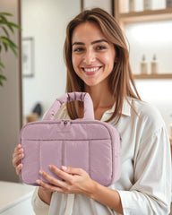 BAGSMART Puffy Toiletry Bag purple handle close-up highlights soft, pressure-relieving carry.