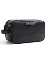 BagSmart Toiletry Bag in black leather close-up showing premium gloss and travel organization