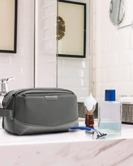 BAGSMART toiletry bag grey open zip demonstrates wide opening for quick access.