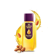 Bajaj Almond Drops hair oil bottle front showing brand and 475ml packaging for silky shine