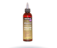 Barber Shop Aid alopecia oil bottle pour supports scalp nourishment and healthier-looking hair.