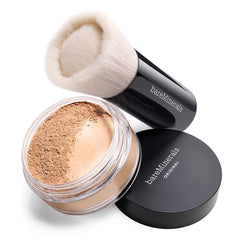 bareMinerals Beautiful Finish Brush in hand shows large skirted head for faster coverage.
