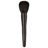 BareMinerals Supreme Finisher powder brush applying a sheer setting powder finish.