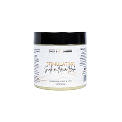Bask & Lather scalp balm bottle shows mango and peppermint for refreshing moisture.