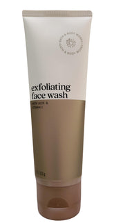 Bath & Body Works exfoliating face wash bottle pour showing aloe and vitamin E goodness.
