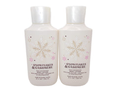 Bath & Body Works Snowflakes & Cashmere 8oz bottle pouring for lasting moisture.