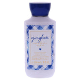 Bath & Body Works Gingham Body Lotion bottle close-up shows up to 24-hour moisture for all skin types.
