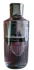 Bath & Body Works Graphite body cream texture on finger showing hyaluronic acid hydration