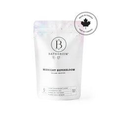 Bathorium Midnight Superbloom Crush bath scene with candlelight for relaxation.
