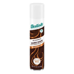 Batiste Divine Dark can closeup showing tinted formula blending with brunette hair