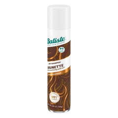 Batiste Dry Shampoo Brunette applying spray on roots for faster style resets.