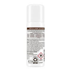 Batiste Dry Shampoo Dark spray action demonstrates quick application and texture boost.