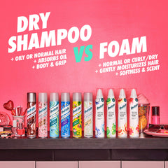 Batiste Tropical Dry Shampoo bottle-front highlights compact size for refreshing on the go