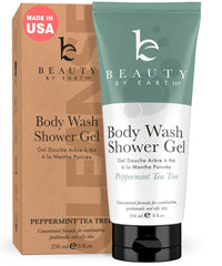 Beauty by Earth peppermint tea tree oil shower gel bottle closeup for refreshing, gentle cleanse.
