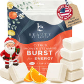 Beauty by Earth shower steamer packaging highlights gift-ready citrus aromatherapy.