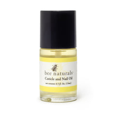 Bee Naturals oil applied to nails for nourishing cuticles.