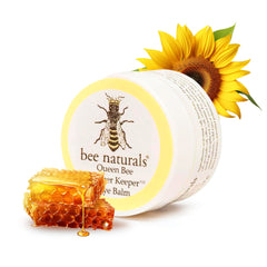 Bee Naturals Queen Bee Eye Balm tube closeup showing fragrance-free moisture for sensitive eyes
