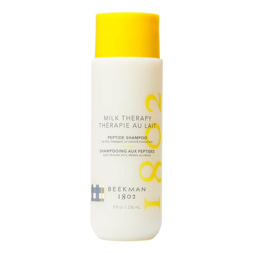 Beekman 1802 Milk Therapy Shampoo bottle offering gentle cleansing for sensitive scalps