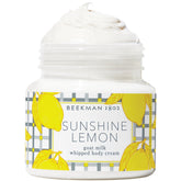 Beekman 1802 whipped body cream jar with sunshine lemon fragrance for deep hydration.