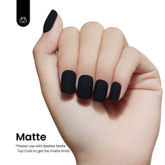 Beetles Black Winter Gel Polish application in progress demonstrates smooth coverage.