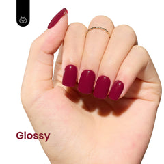 Beetles gel polish bottle close-up highlights glossy wine red finish.