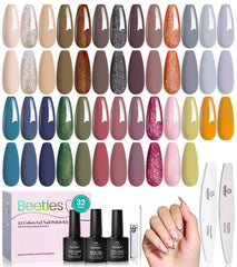 Beetles Winter gel nail polish set packaging showcases 25 colors for festive manicure ideas.