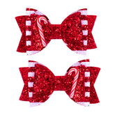 Beleki glitter candy cane bow clip with secure clip for festive hairstyle