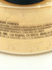 Ben Nye Banana application brush portrait showing lightweight application for flawless complexion
