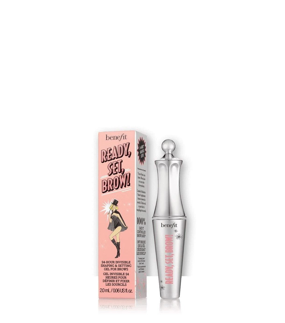 Benefit Brow Setter travel-size bottle applying clear gel to brows