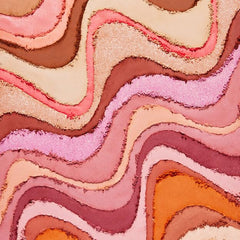 Benefit applied on cheek showing natural luminous glow and subtle brightening