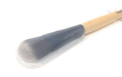 Benefit foundation brush front view showing sleek handle and precise head for even application